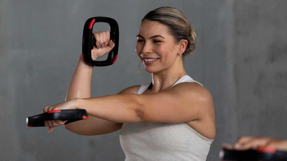 Using light hand weights during LES MILLS SHAPES